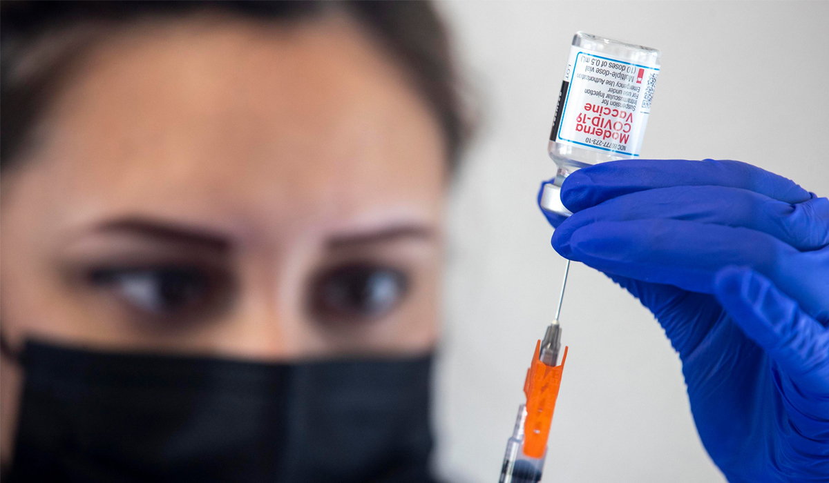 Coronavirus vaccines cut risk of long Covid, study finds